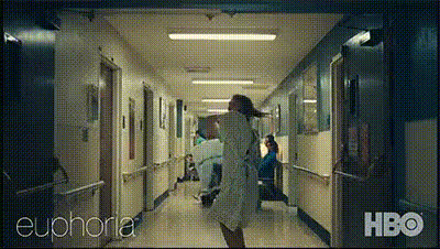 woman-dancing-in-hospital-gown