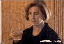 woman-holding-a-glass