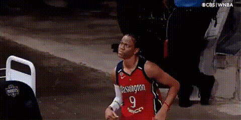 woman-in-basketball-uniform