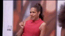 woman-in-red-dress-pointing