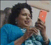 woman-looks-at-cell-phone