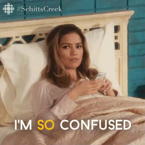 woman-looks-confused-in-bed