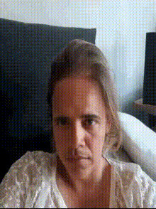 woman-on-bed-selfie