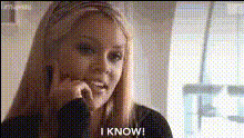 woman-on-phone-call-reacts