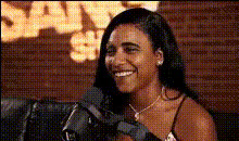 woman-smiling-at-microphone
