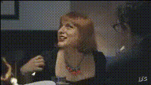 woman-smiling-at-restaurant