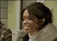 woman-smiling-with-microphone