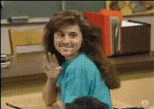 woman-waving-in-classroom