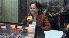 woman-wearing-headphones-smiling