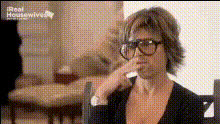 woman-wearing-sunglasses-talking