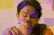 woman-with-lollipop-in-mouth