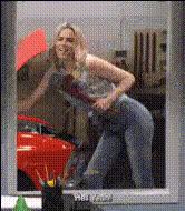 woman-with-wrench-near-car