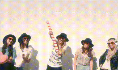 women-laughing-with-confetti