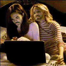women-on-bed-with-laptop