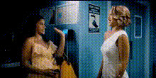 women-standing-in-hallway