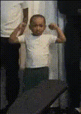 young-boy-flexing-muscles