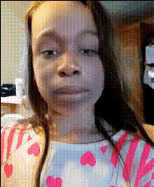 young-girl-with-hearts-shirt