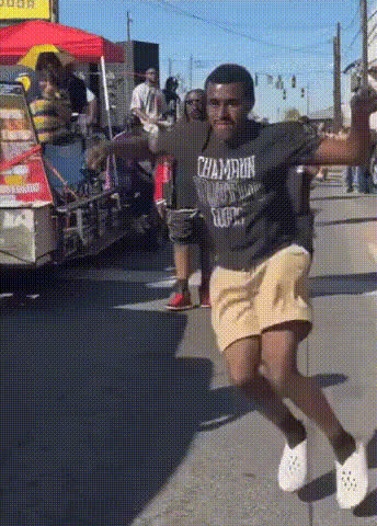 young-man-dancing-on-street