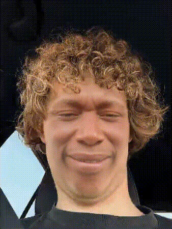 young-man-smiling-awkwardly