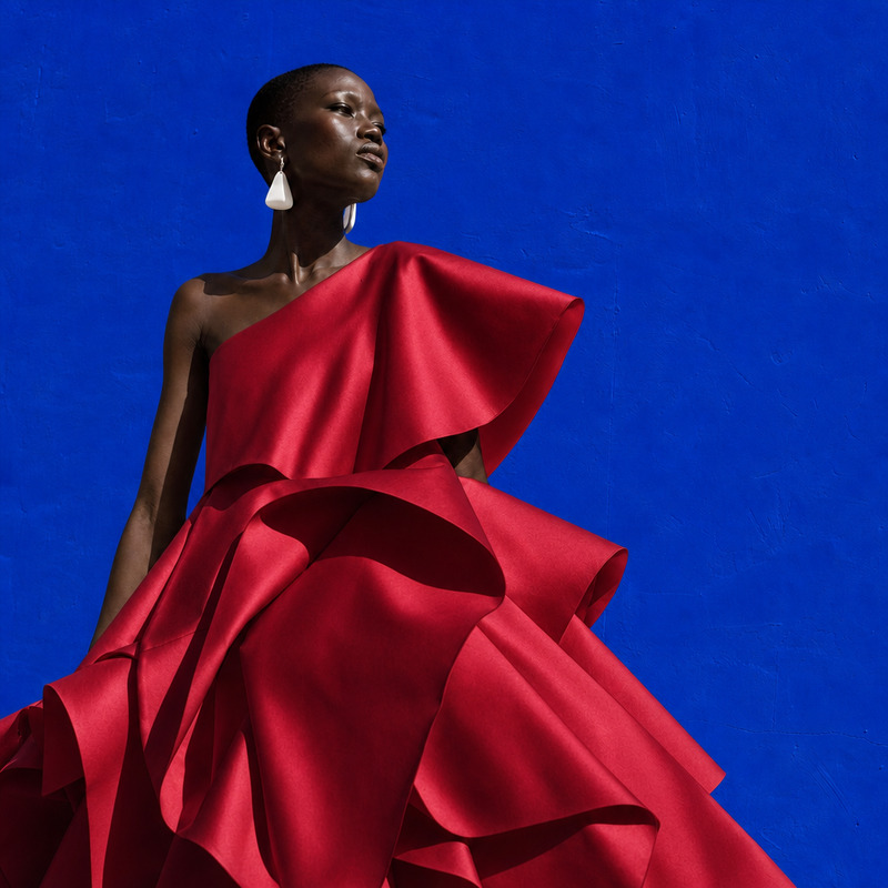 AI Image Editor · Change the dress to sculptural