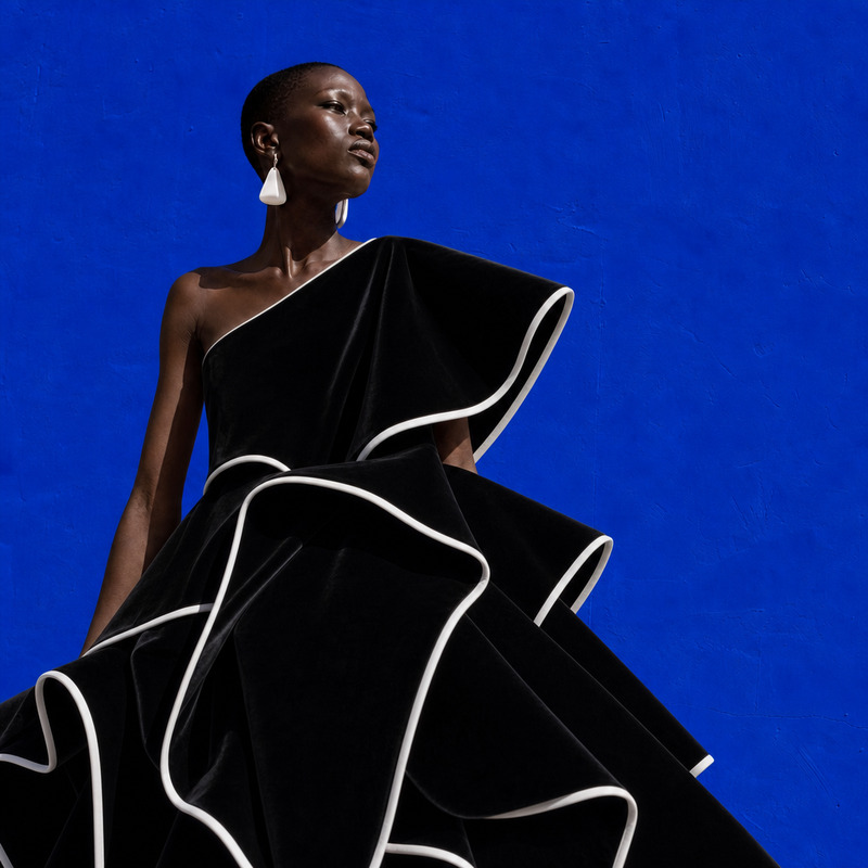 AI Image Editor · Change the dress to tailored b