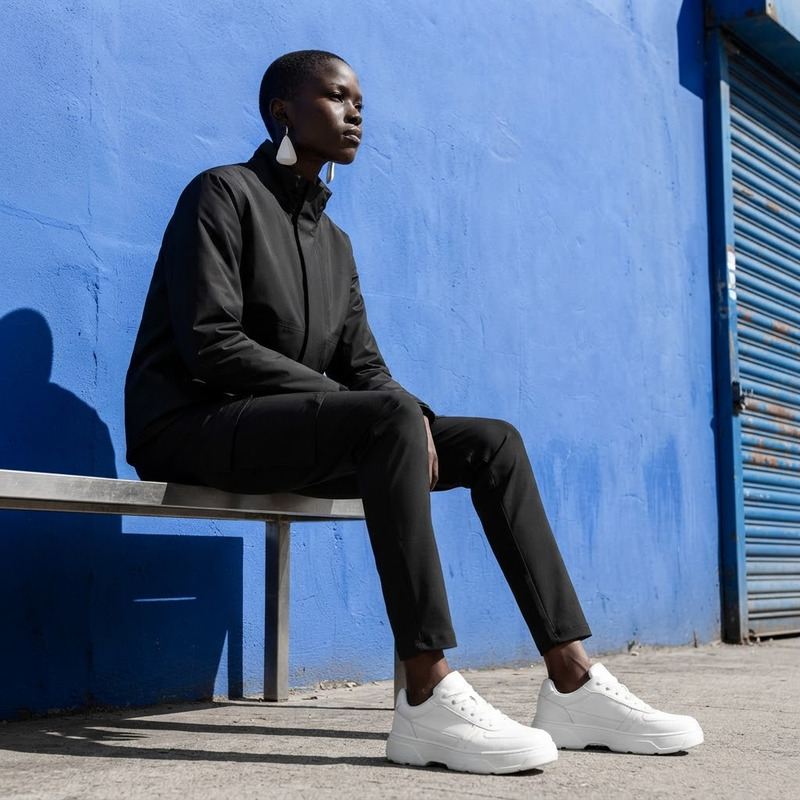 AI Image Editor · Change the outfit into minimal
